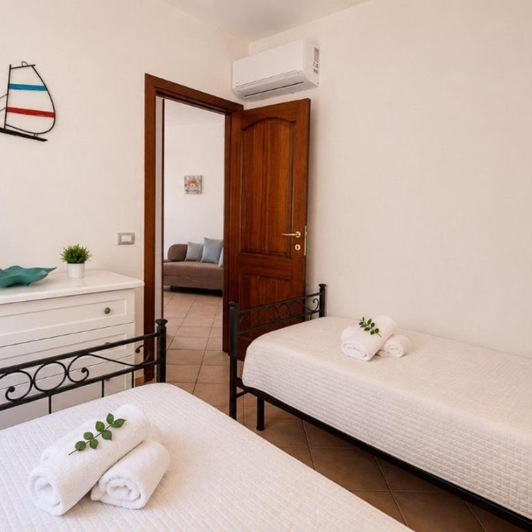 AffittaSardegna - Trilo l'Onda Blu - Appartamento con 2 Camere da Letto - 14
