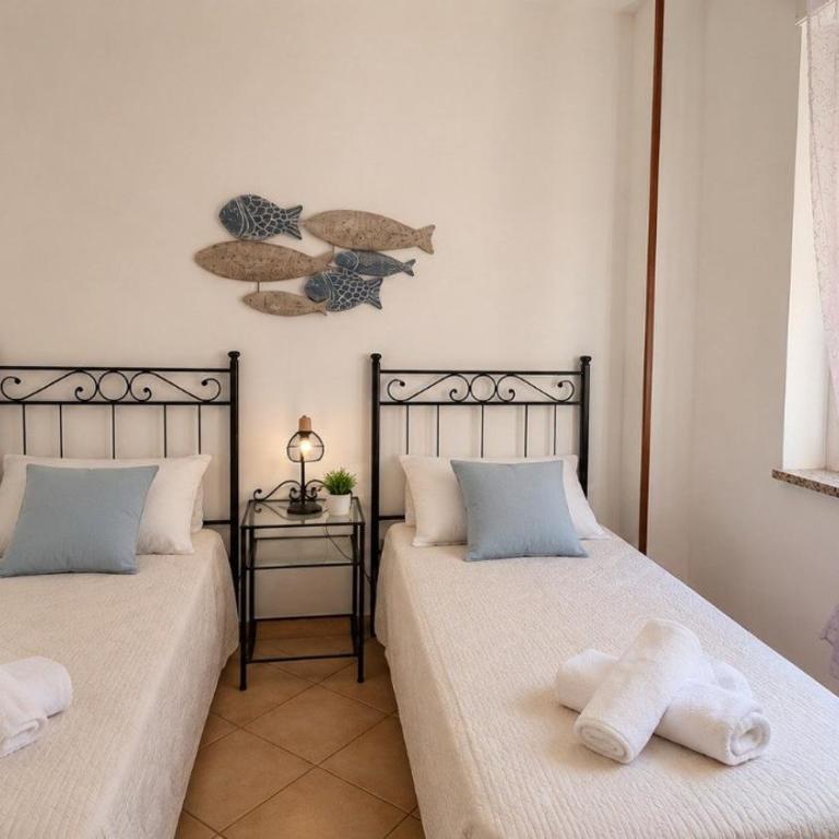 AffittaSardegna - Trilo l'Onda Blu - Appartamento con 2 Camere da Letto - 16