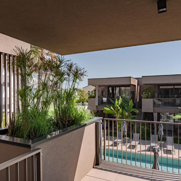 Sun Village Residence con Piscina - Piazza Aurora - Adria Holiday Jesolo - FAMILY APARTMENTS - Appartamento con 2 Camere da Letto e Vista Piscina - 33