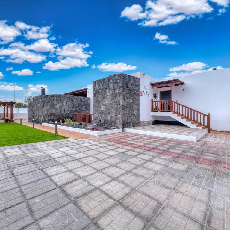Villa Los Yeyos - Ocean views, Pool, BBQ and Billiard By Lanzarote Vacation Homes - Haus mit 4 Schlafzimmern - 67