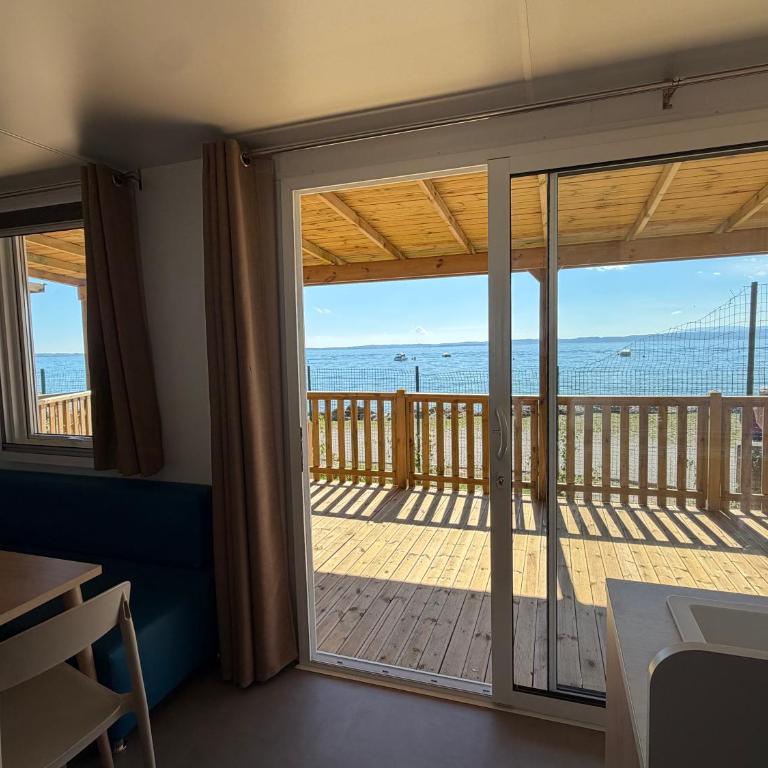Camping Cisano - San Vito - Camera Familiare con Vista Lago - 8