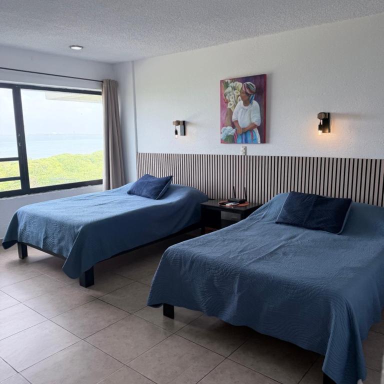 Beachfront 1BR Beach & Pool Lagoon Sunset View Hotel Zone - One-Bedroom Apartment - 4