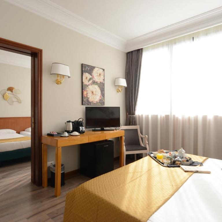 Hotel The Brand - Camera Tripla Standard - 4