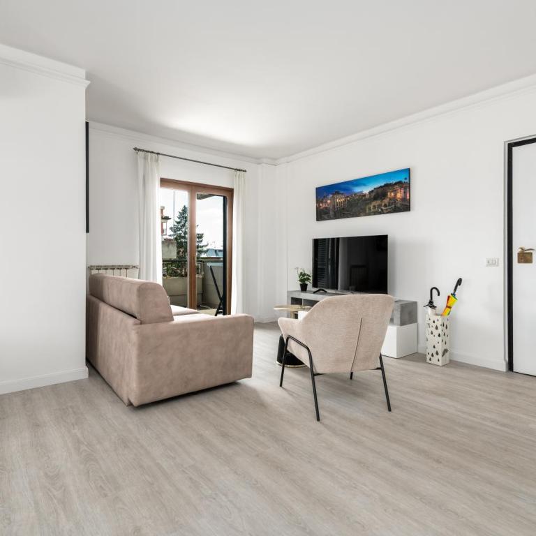 La Casa del Tomo - Metro A - Parcheggio Privato - 6 ospiti - Appartamento con 2 Camere da Letto - 80