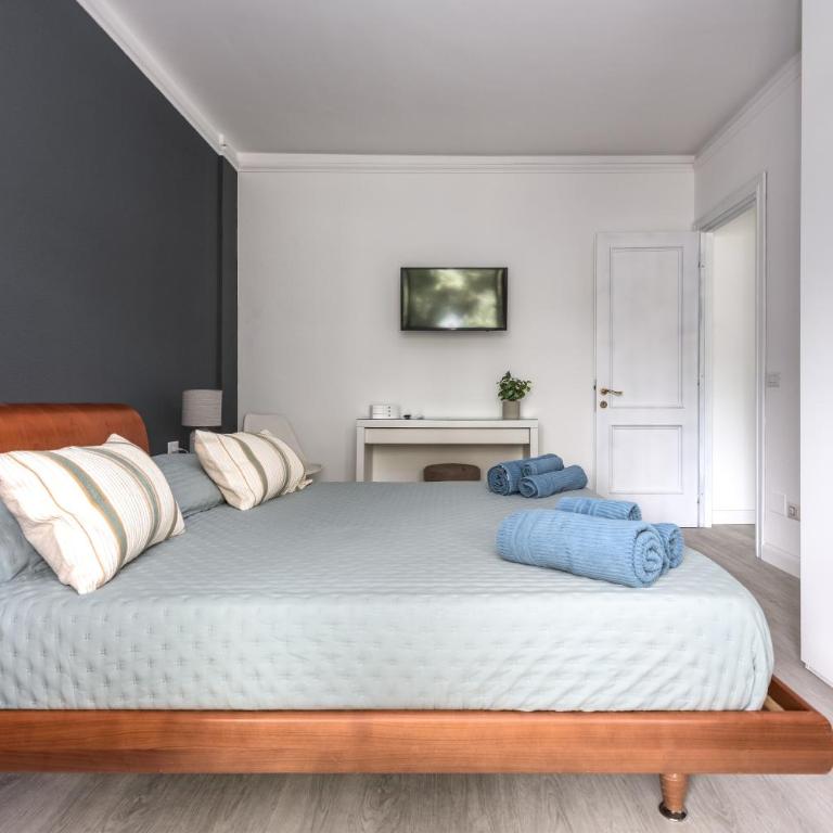 La Casa del Tomo - Metro A - Parcheggio Privato - 6 ospiti - Appartamento con 2 Camere da Letto - 82