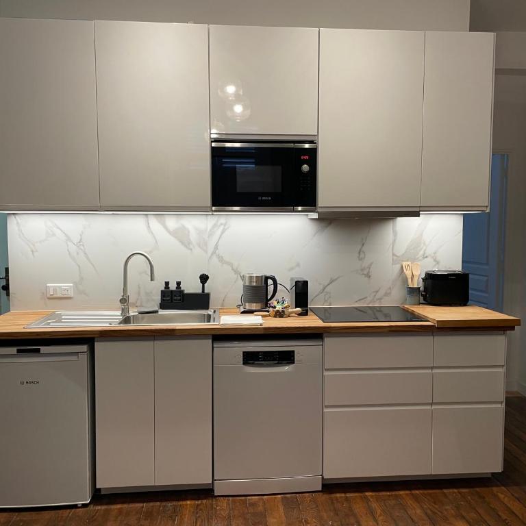 Appartements boutique dans un hôtel particulier rénové Centre & gare Parking privé Villa Vermillon Galerie - Apartamento con vistas al jardín - 17