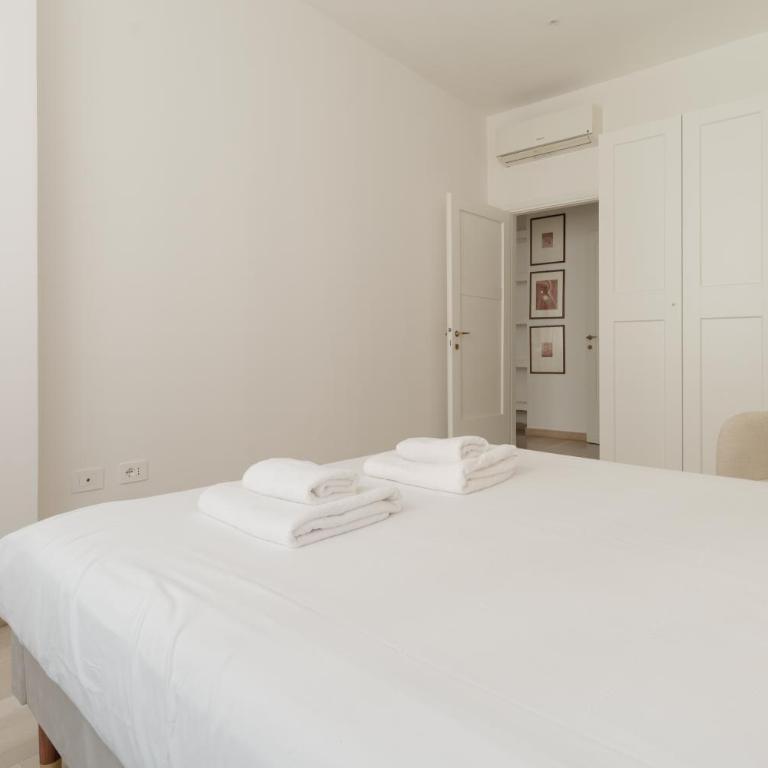 GuestHost - Cozy Balcony Apartment X6 Guastalla - Appartamento con 2 Camere da Letto e Balcone - 14