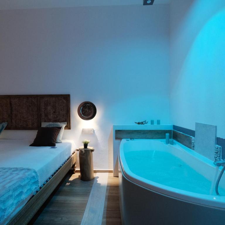 RADICI DI LUNA Exclusive Design - Suite con Vasca Idromassaggio - 24