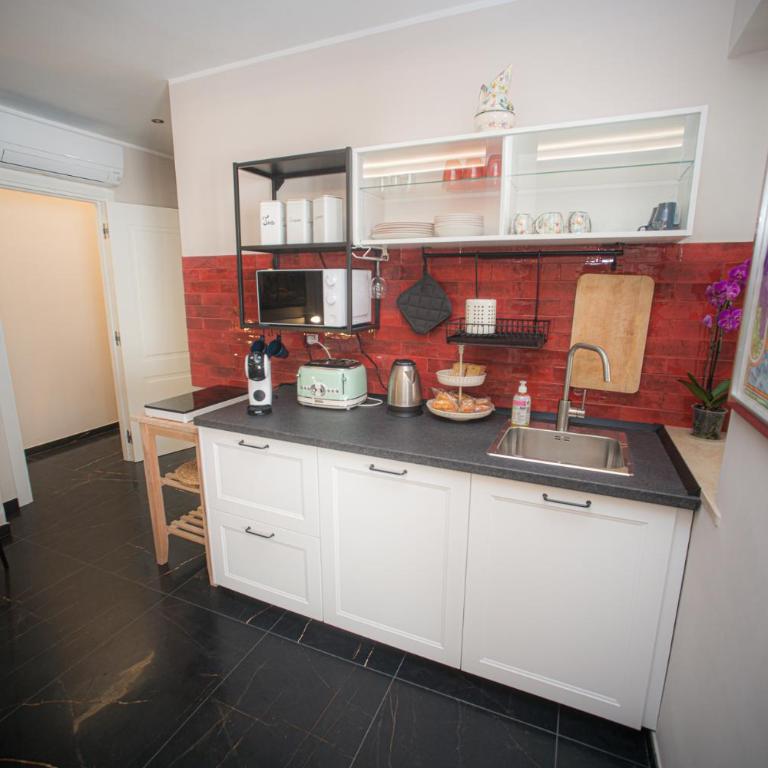 PataPam luminosissimo monolocale Lido di Roma - Two-Bedroom Apartment - 8