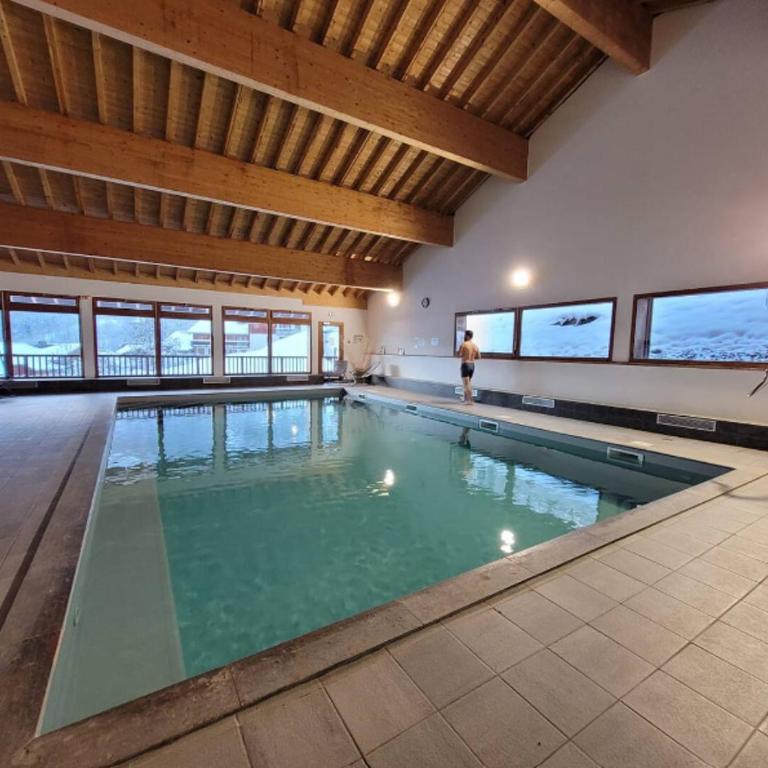 Hôte Altitude - Appartement 2 Chambres avec Terrasse - 53