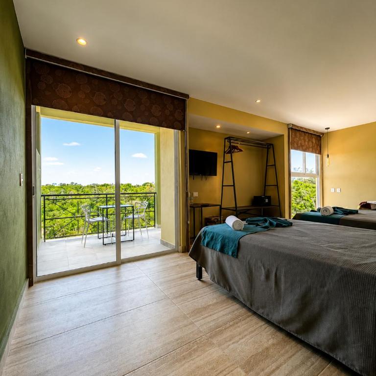 LOL-HA Cancún Hotel Boutique - Habitación Doble con vistas al jardín - 2 camas - 4