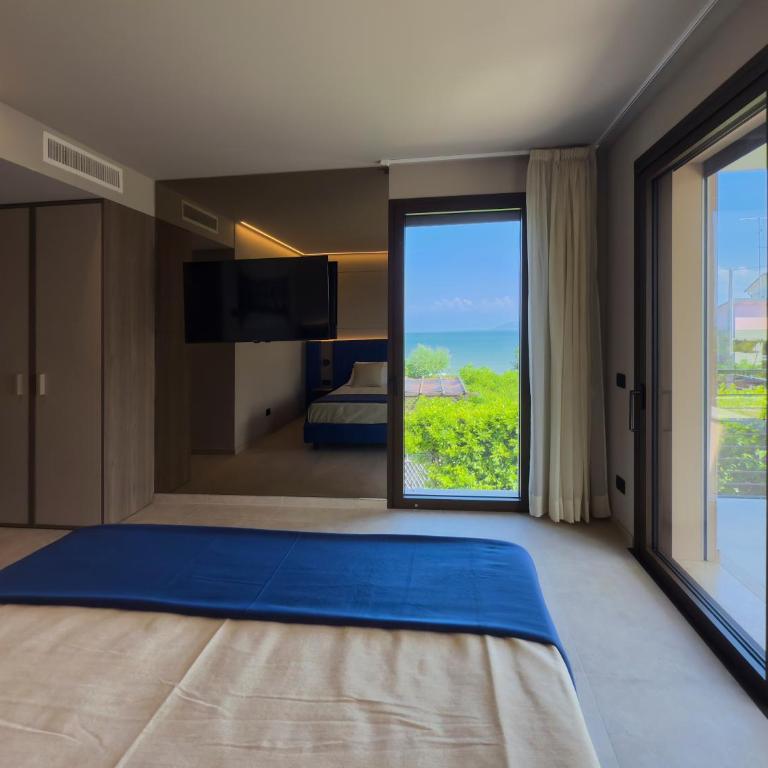Nettuno Residence Hotel - Suite con Terrazza e Vista Lago - Edificio Separato - 5