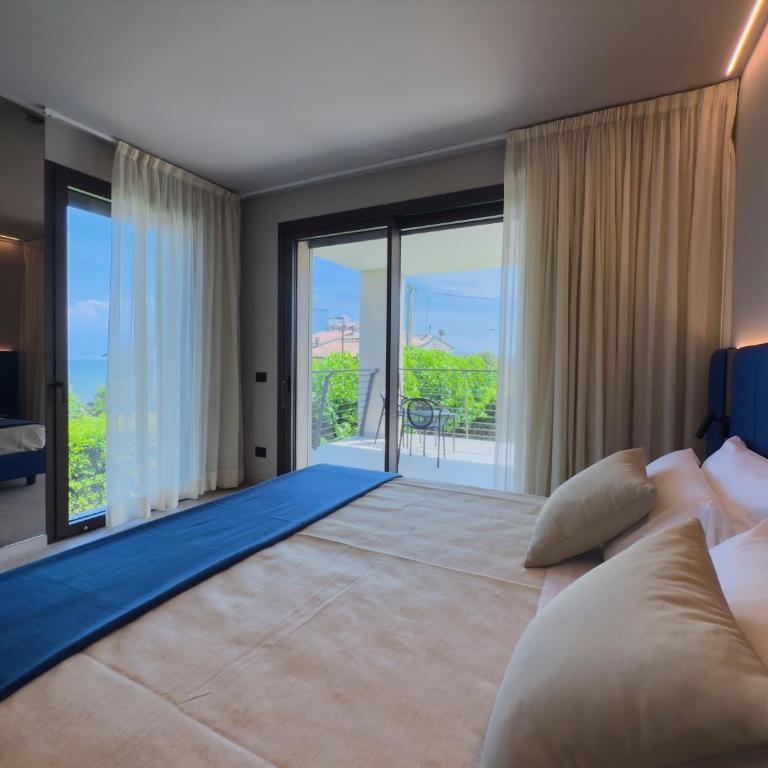 Nettuno Residence Hotel - Suite con Terrazza e Vista Lago - Edificio Separato - 13
