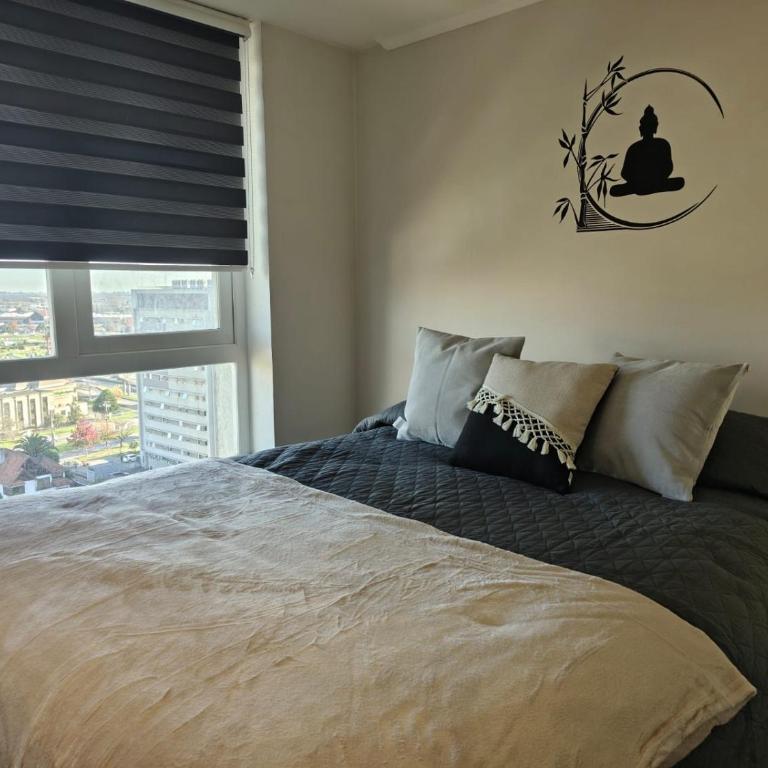 Acogedor y luminoso depto cerca de mall Trébol - Apartamento de 2 dormitorios - 55