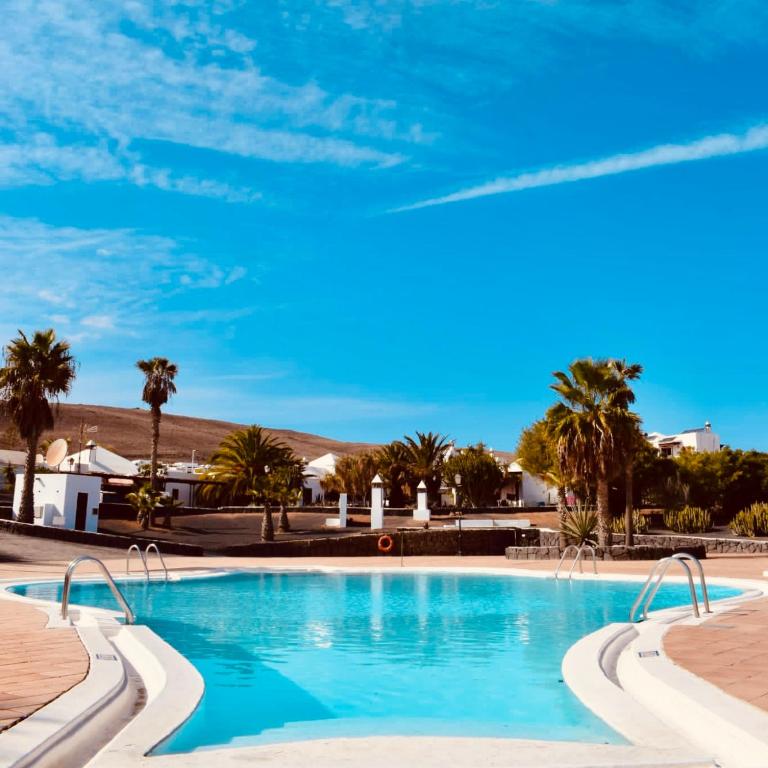 Cosy villa Alegranza 105, communal pool, private garden - Casa con 2 Camere da Letto - 1