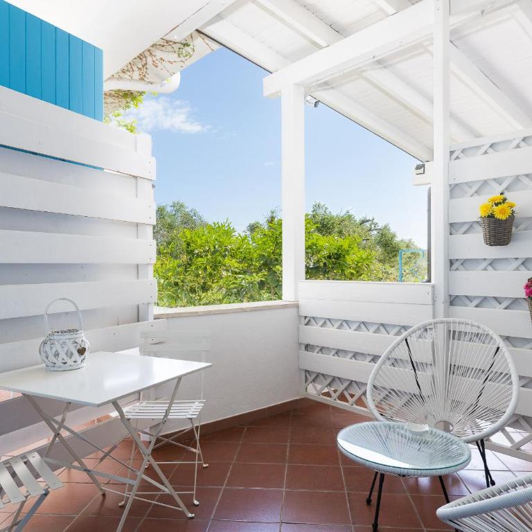 PALMASERA CHARMING - Rooms & Suites - Camera Matrimoniale Superior con Terrazza - 10
