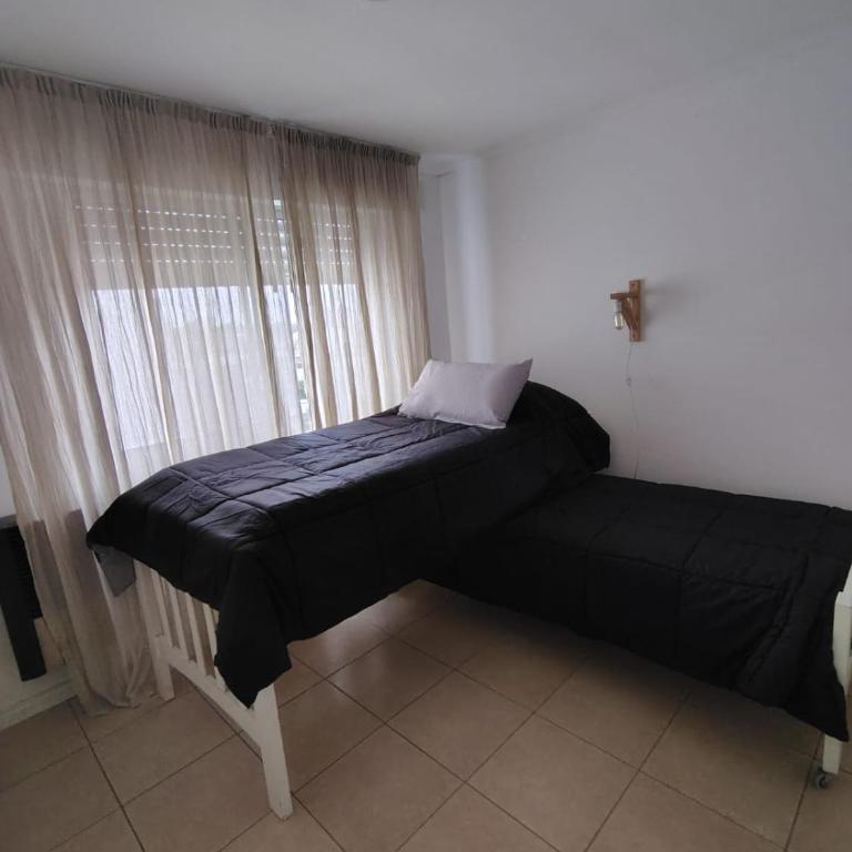 Departamento 2 habitaciones céntrico con cochera - Apartamento de 2 dormitorios - 2