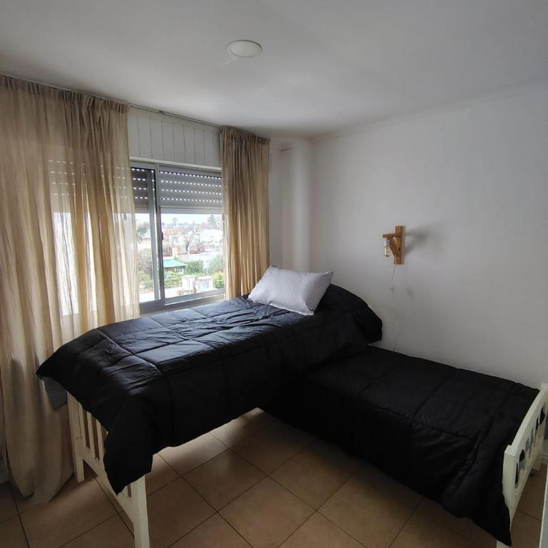 Departamento 2 habitaciones céntrico con cochera - Apartamento de 2 dormitorios - 12