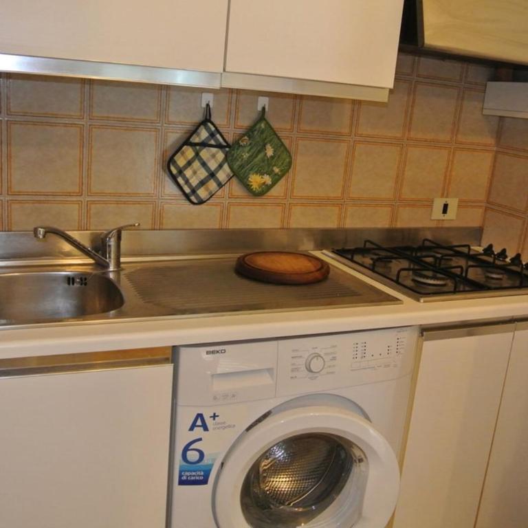 Cozy flat with pool just 50m from the beach - Apartment - 4