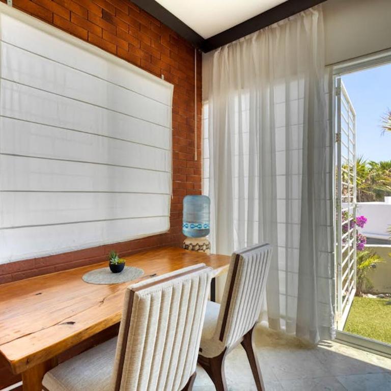 Charming & sunlit condo with pool & balcony - near golf, beaches, & nightlife - Vacation Home - 17