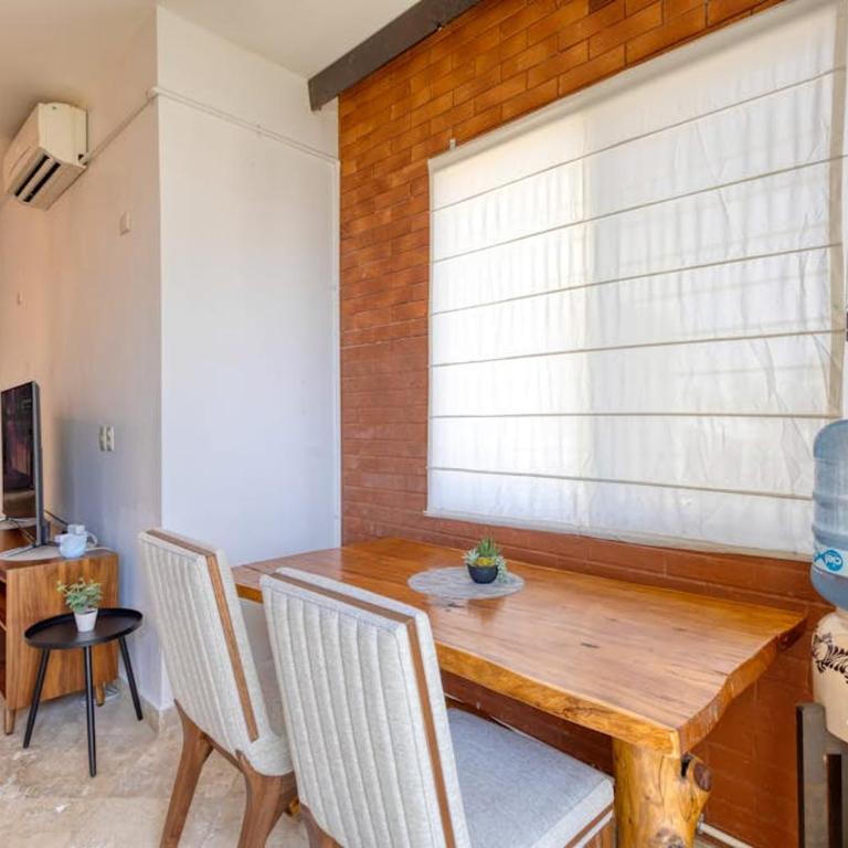 Charming & sunlit condo with pool & balcony - near golf, beaches, & nightlife - Vacation Home - 18