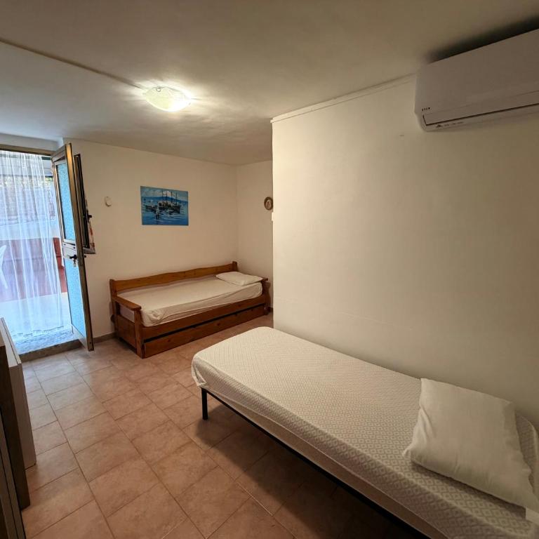 Radici Casa Vacanze - Appartamento con 1 Camera da Letto - 2