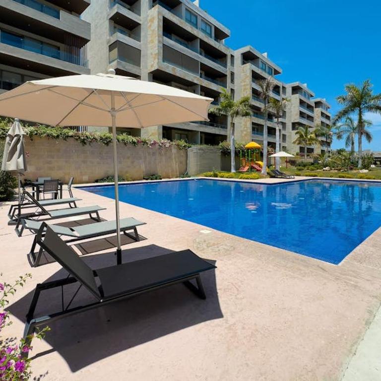 Bright Coastal Condo with Ocean-view Balcony, Gym, Pools, BBQ & kid’s park - Ferienhaus - 33