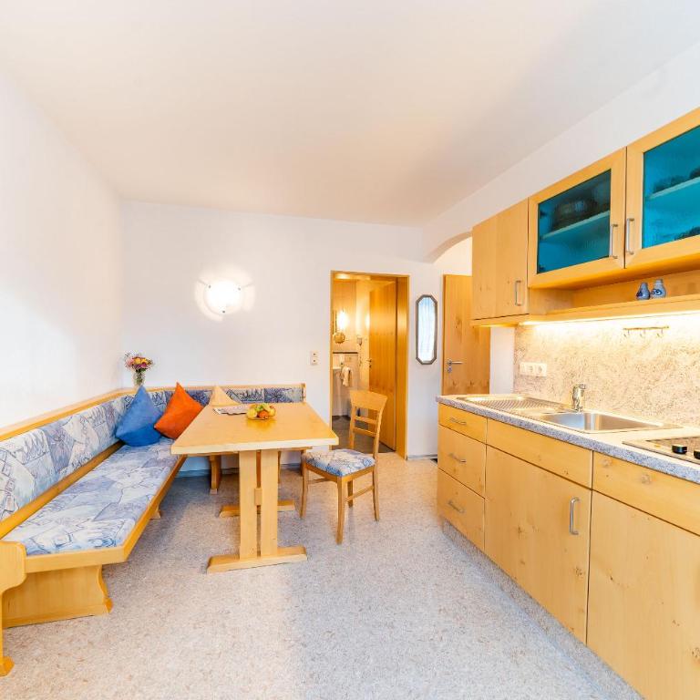 Hotel Alpenhof - Apartment mit 1 Schlafzimmer und Gartenblick - 1