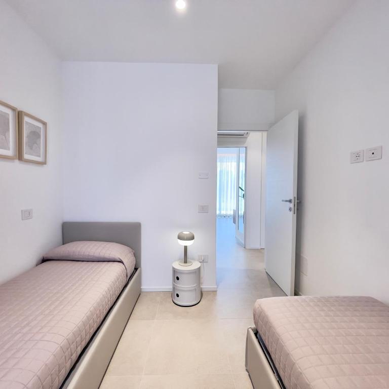 Riviera Residence - Appartamento con 2 Camere da Letto e Vista Giardino - 10