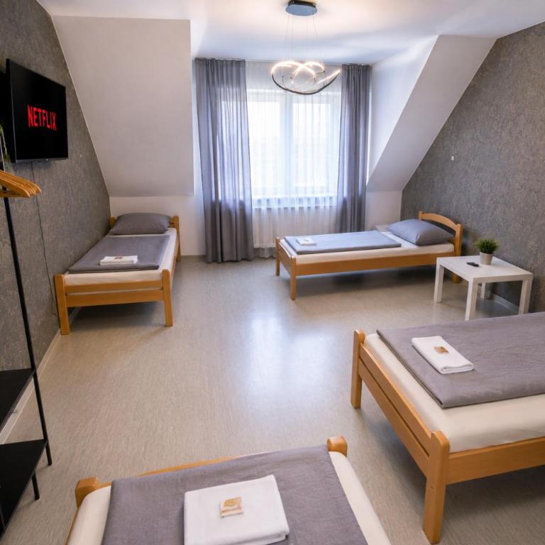 Moderne Appartement - Vierbettzimmer mit Gemeinschaftsbad - 2
