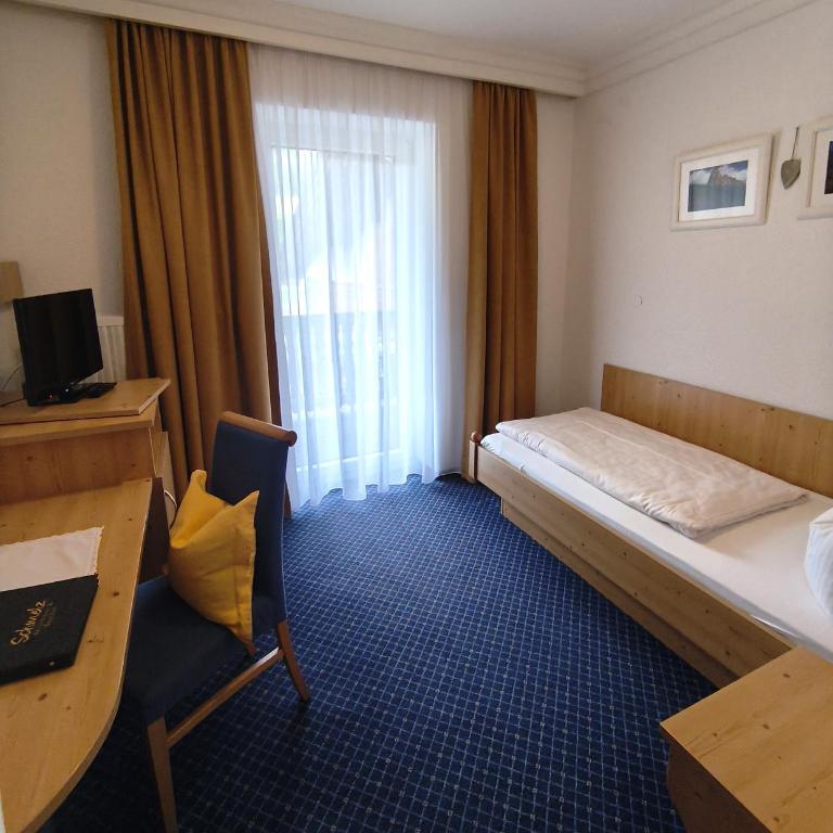 Aktivhotel & Gasthof Schmelz Ihr familienfreundliches Urlaubs Hotel mit Wellness, Almsauna, Chiemgau Karte - Classic Einzelzimmer - 4