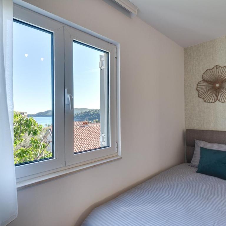 Valiya Residences Bečići - Two-Bedroom Deluxe Apartment with Ocean View - 17