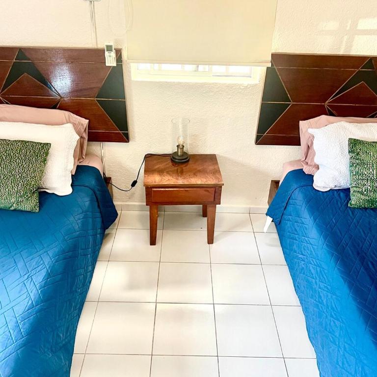 Departamento en Cancún Céntrico con piscina Renta de autos y tours - Three-Bedroom Apartment - 5