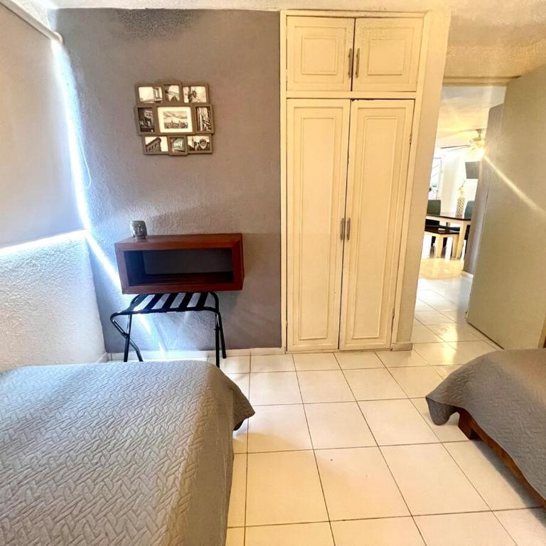 Departamento en Cancún Céntrico con piscina Renta de autos y tours - Three-Bedroom Apartment - 8