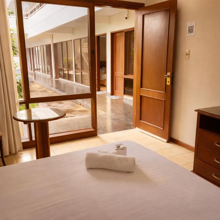 Hotel Asturias - Habitación Doble Estándar con vistas al jardín - 2 camas - 11