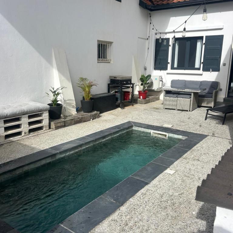 Surf lodge terrasse vue mer, piscine privée, Climatisation - One-Bedroom Apartment - 16
