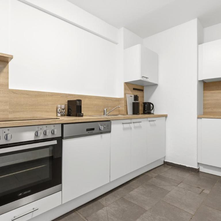 Alpena Homes, Zentrum, sehr geräumig, Küche - Apartment mit 2 Schlafzimmern - 8