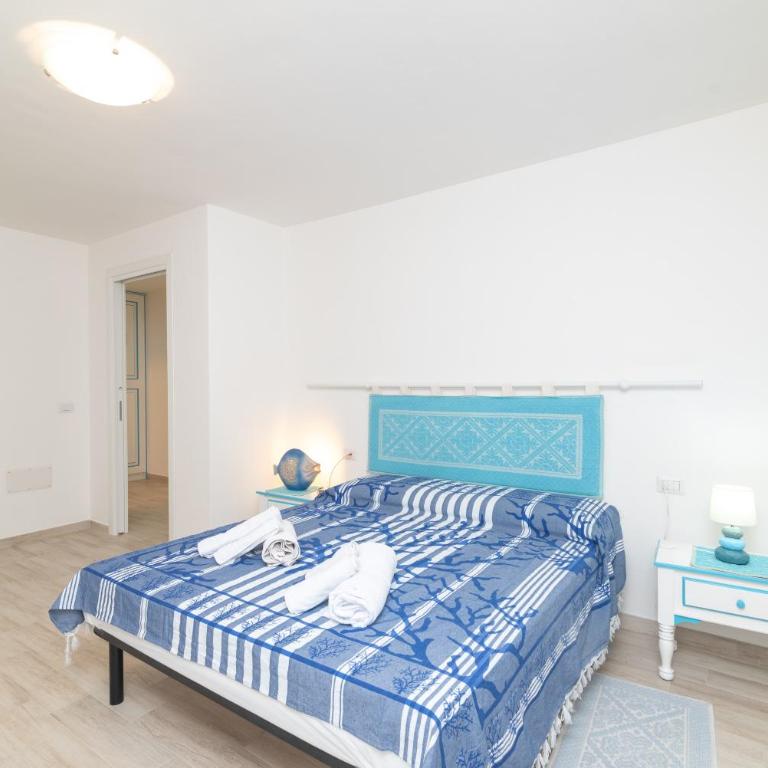 Bilocale nuovo Budoni centro - Appartamento con 1 Camera da Letto e Vista Giardino - 10
