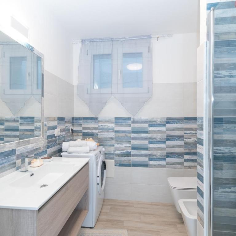 Bilocale nuovo Budoni centro - Appartamento con 1 Camera da Letto e Vista Giardino - 12