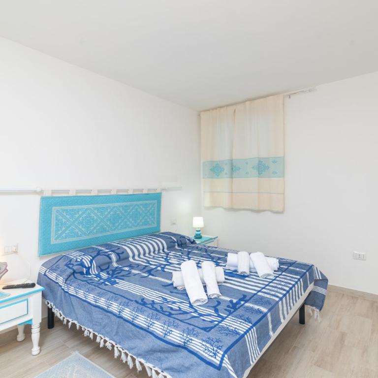 Bilocale nuovo Budoni centro - Appartamento con 1 Camera da Letto e Vista Giardino - 9
