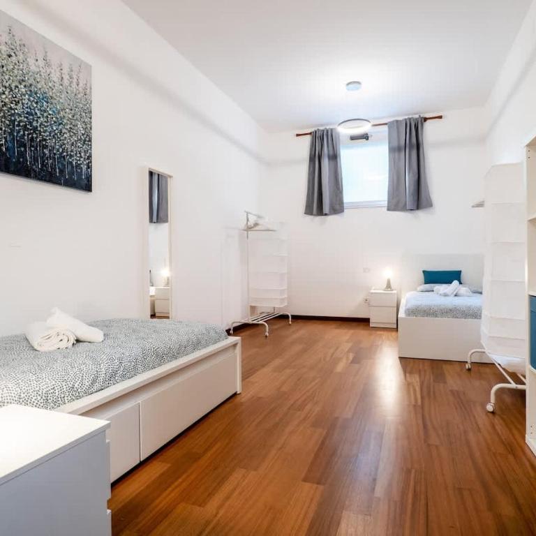 Rosa Bianca - 5 minuti dal Centro con Giardino e Parcheggio Privato - Appartamento con 3 Camere da Letto - 14
