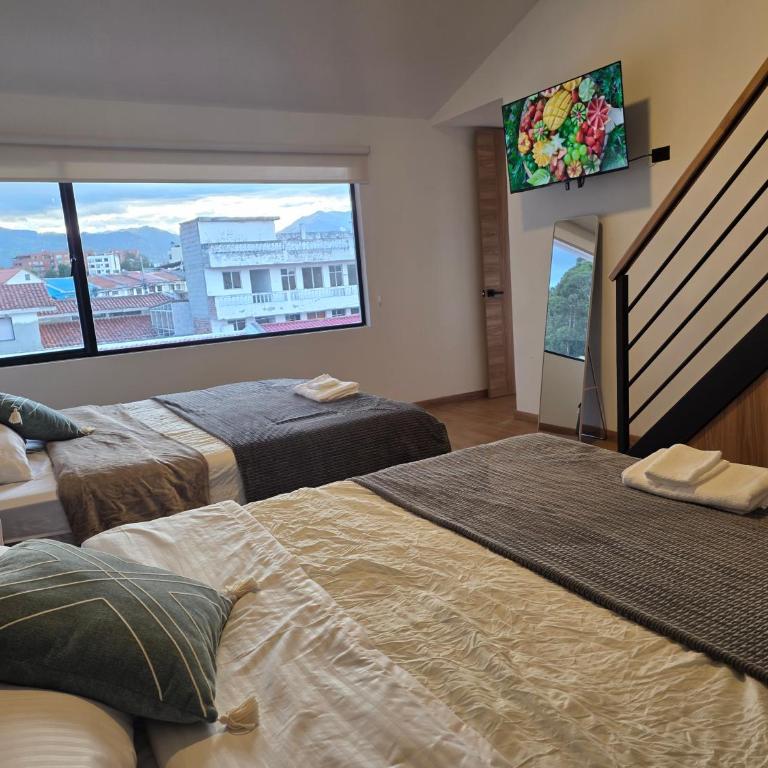Suite Dúplex Tipo Loft, 6 minutos Parque Calderon56 - One-Bedroom Apartment - 13