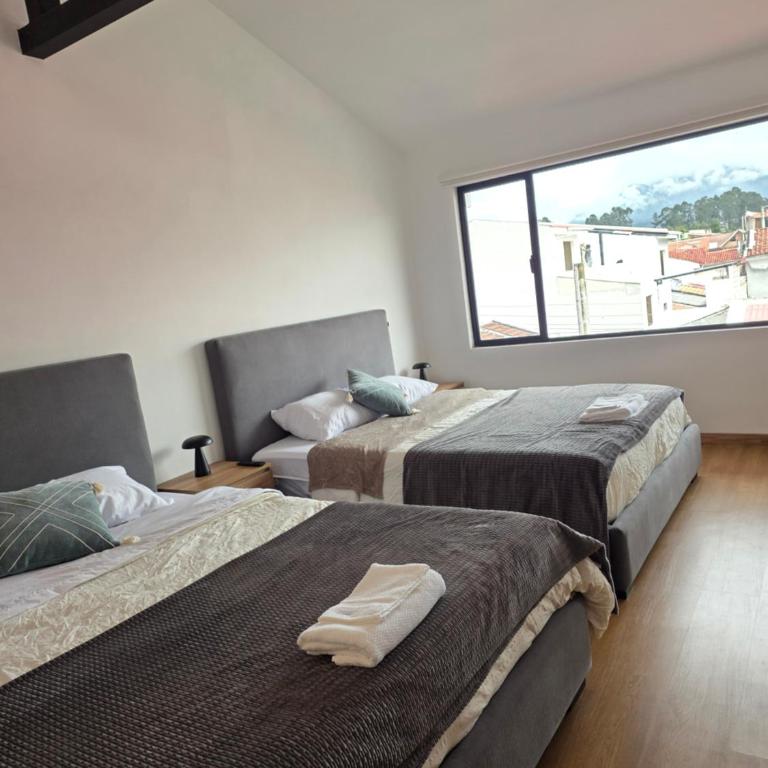 Suite Dúplex Tipo Loft, 6 minutos Parque Calderon56 - One-Bedroom Apartment - 22
