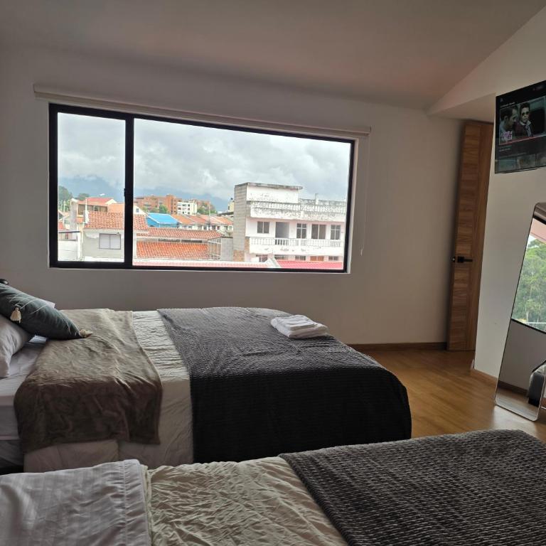 Suite Dúplex Tipo Loft, 6 minutos Parque Calderon56 - One-Bedroom Apartment - 25