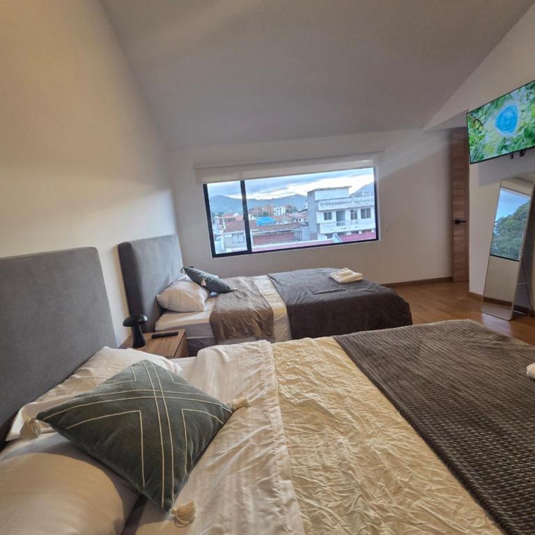 Suite Dúplex Tipo Loft, 6 minutos Parque Calderon56 - One-Bedroom Apartment - 43