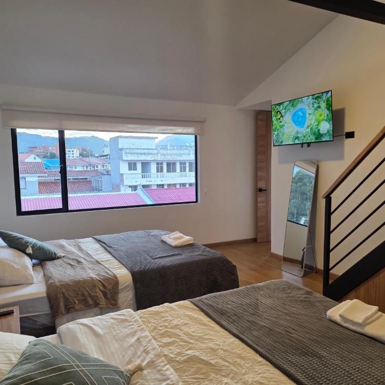 Suite Dúplex Tipo Loft, 6 minutos Parque Calderon56 - One-Bedroom Apartment - 48