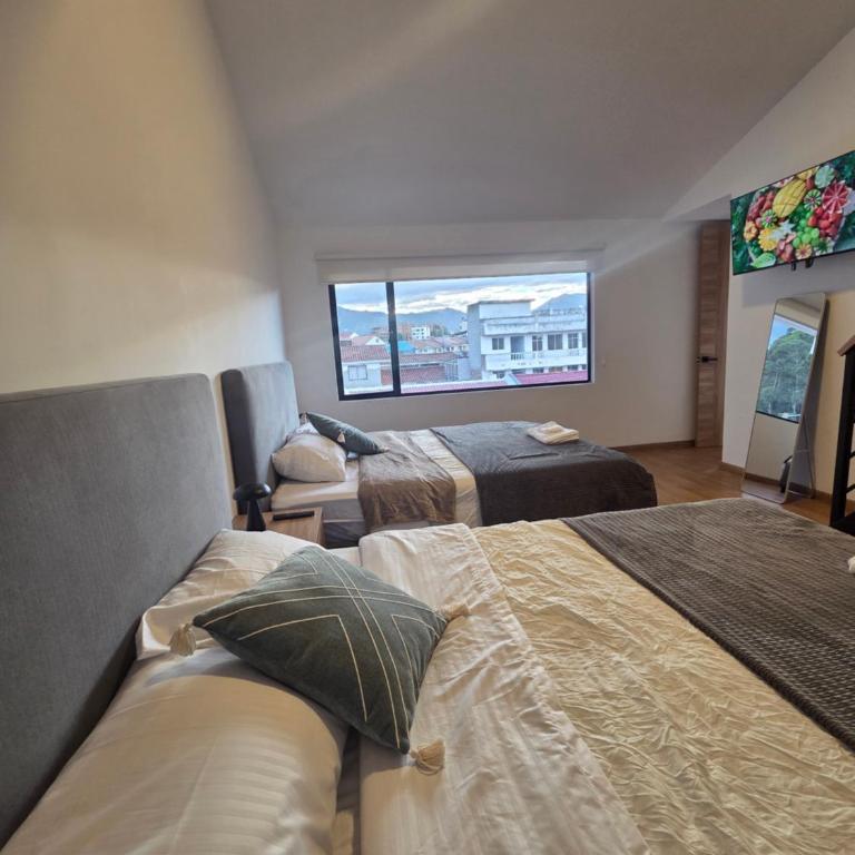 Suite Dúplex Tipo Loft, 6 minutos Parque Calderon56 - One-Bedroom Apartment - 49