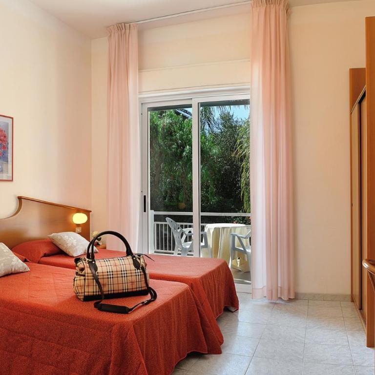 Raffy Family & Bike Hotel - Camera Doppia con Letti Singoli - 5