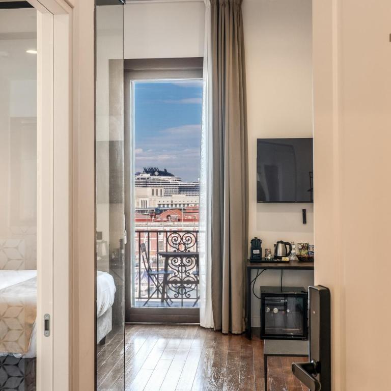 Sette Stelle Suites - Camera Queen con Vista Mare - 1