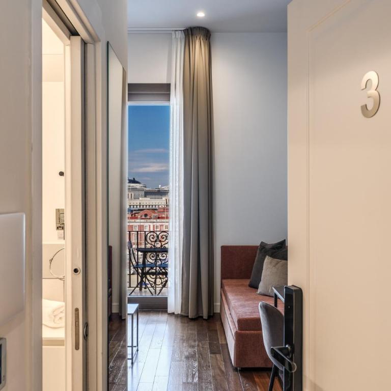 Sette Stelle Suites - Camera Matrimoniale Deluxe con Balcone e Vista Mare - 1